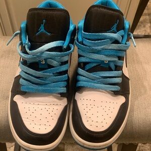 Nike Black and White Sneakers with Vibrant Blue Accents